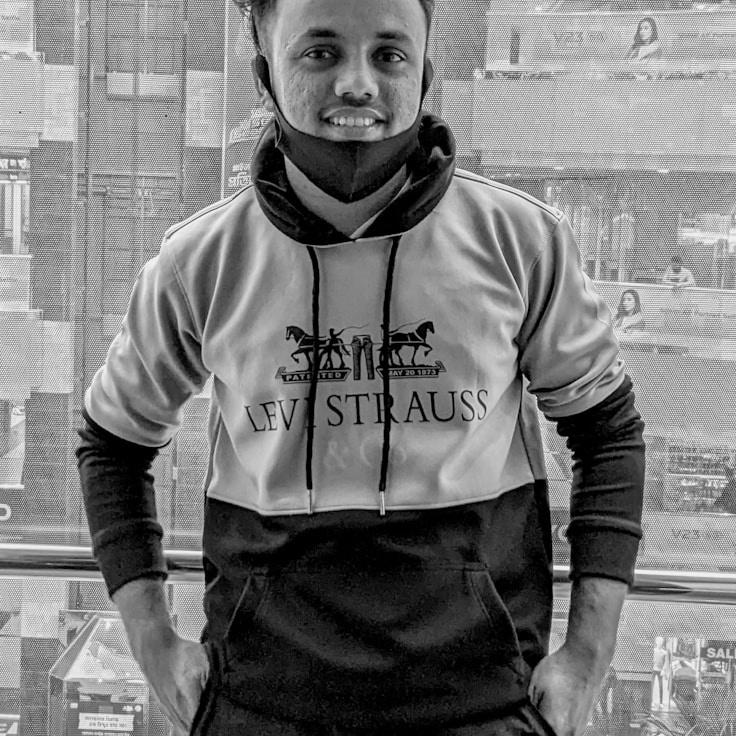 Portrait of Alex Hart, community mentor and Italian cuisine specialist